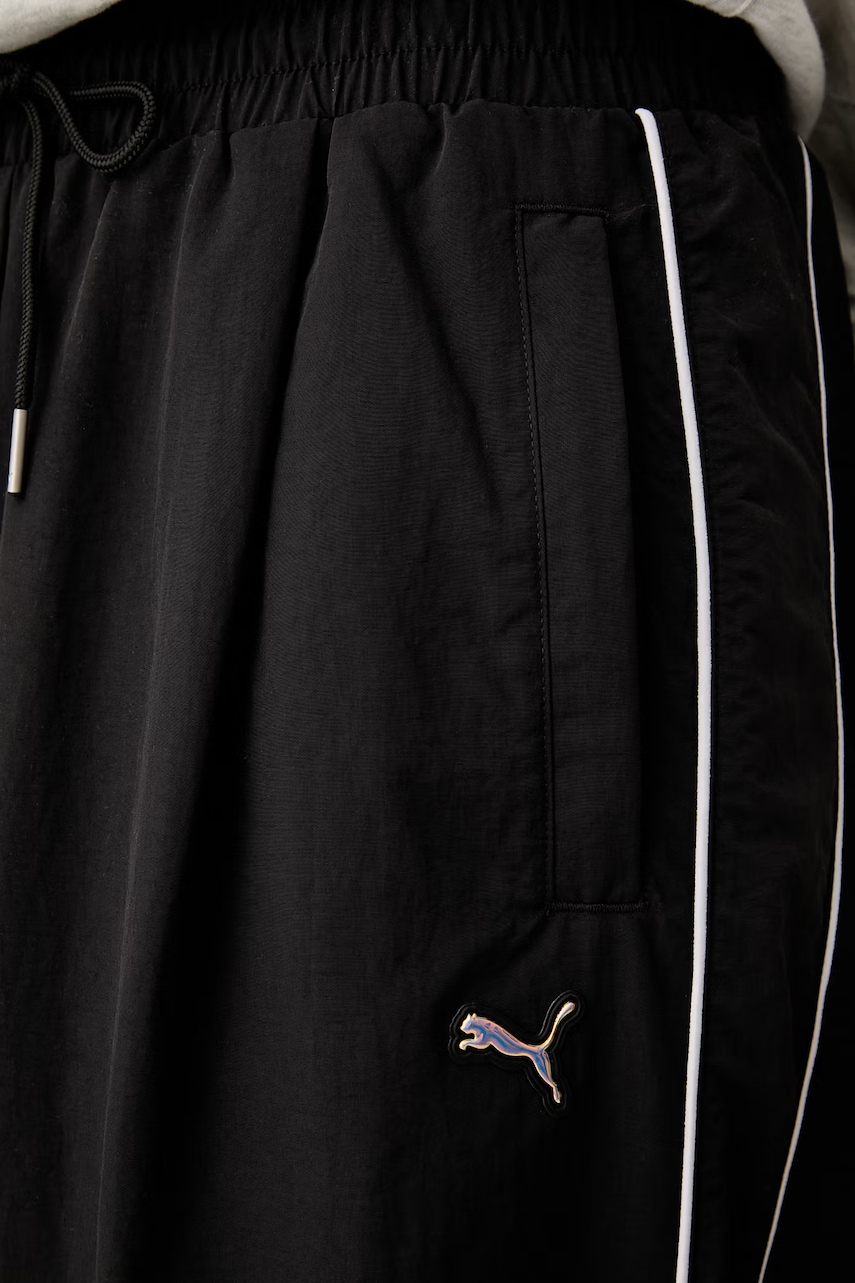 Puma teplákové nohavice dámske Piping Relaxed Woven
