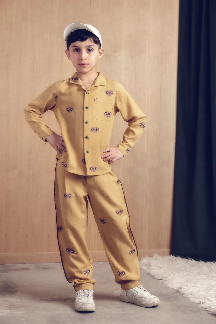 Mini Rodini pantaloni copii E.T. culoarea galben, cu imprimeu, 25830115