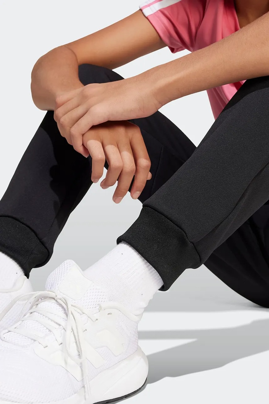 Detské tepláky adidas Performance TIRO25