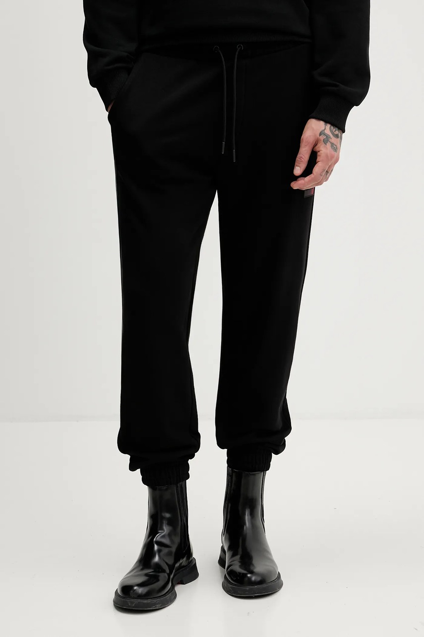 Levně Bavlněné tepláky HUGO Danopan pánské, černá barva, 50553146