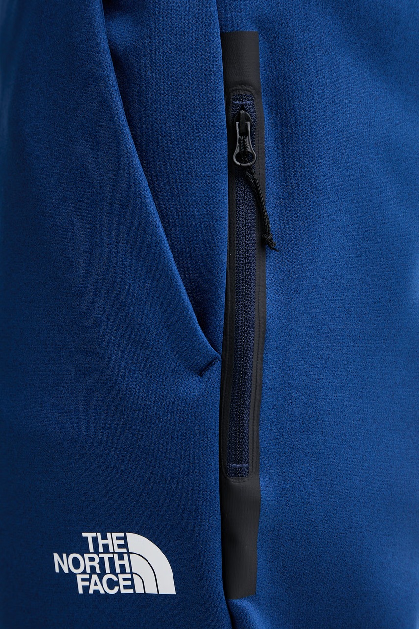 The North Face teplákové nohavice pánske MOUNTAIN ATHLETICS FLEECE