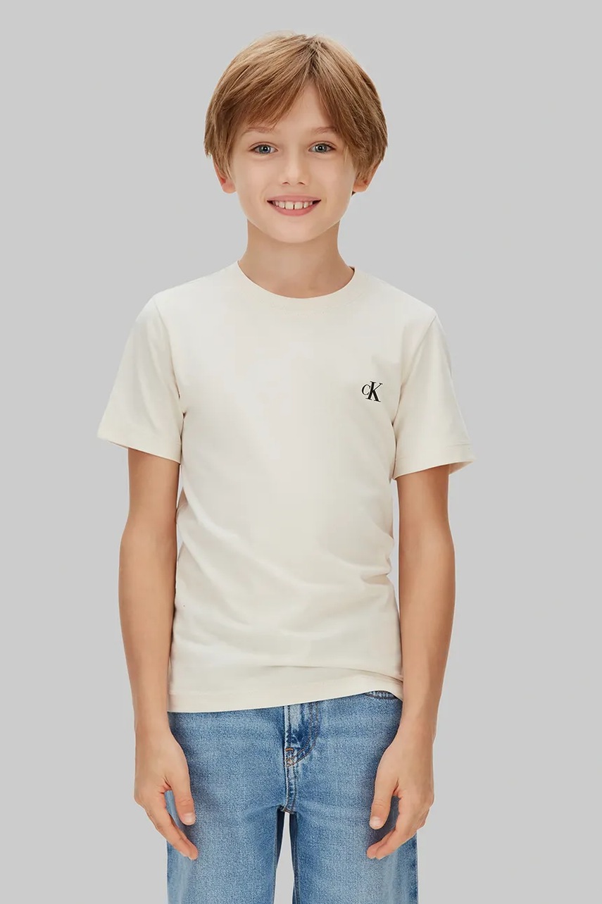 Levně Dětské bavlněné tričko Calvin Klein Jeans 2-pack béžová barva, IB0IB01093