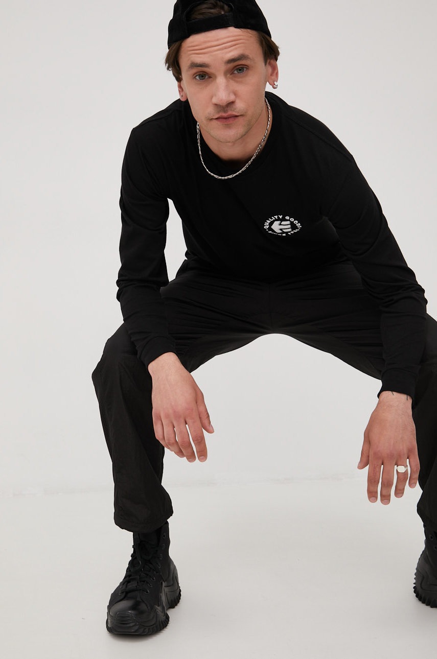 

Бавовняний лонгслів Etnies колір чорний з принтом