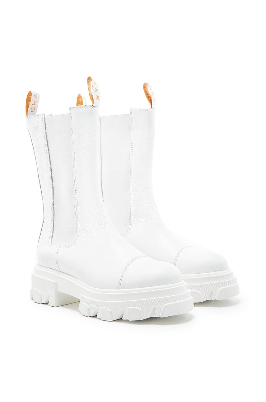 

Замшевые ботинки Charles Footwear женские цвет белый на платформе